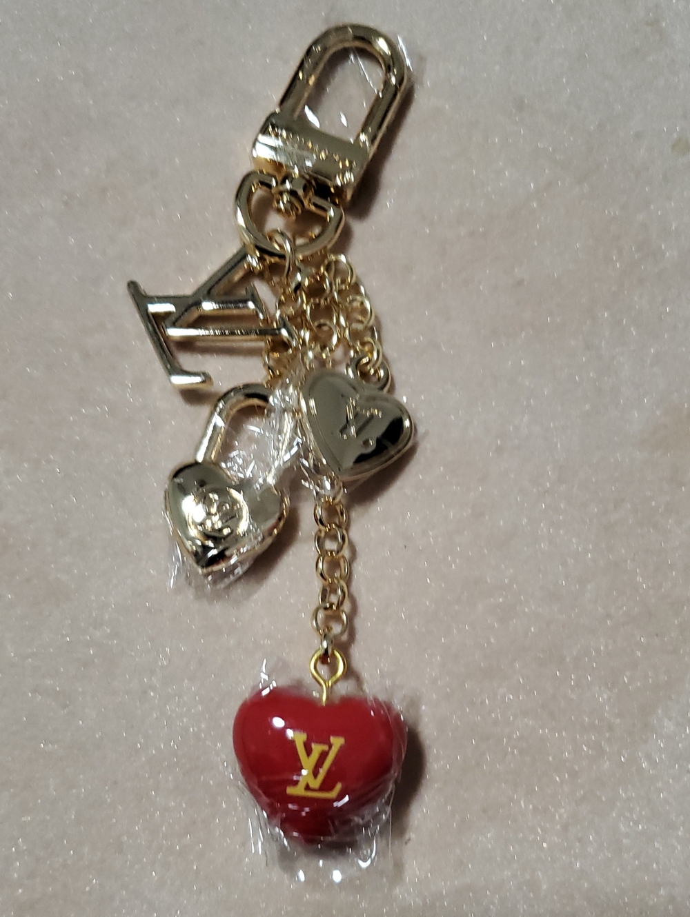 Lv  Gold-Tone Chain Bracelet with Red Heart Charm